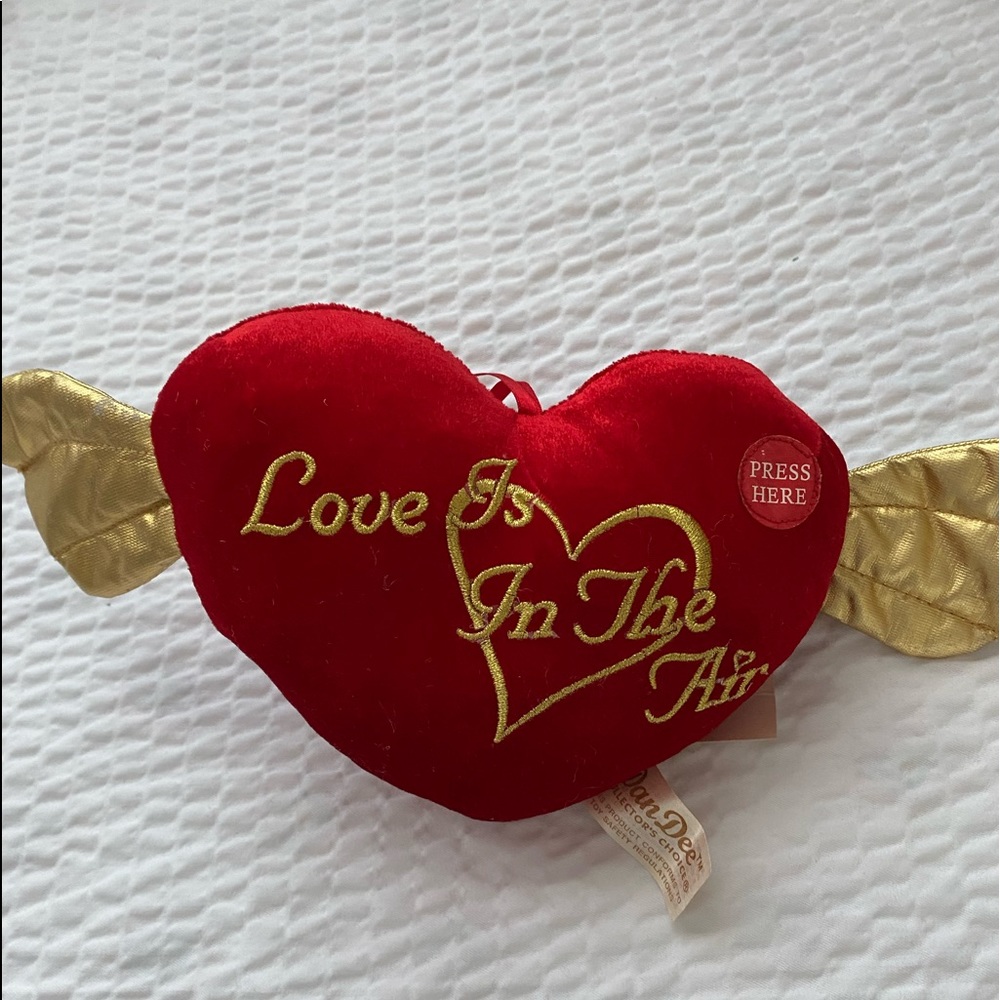 Love in the suit red velvet heart gold writing & wings
